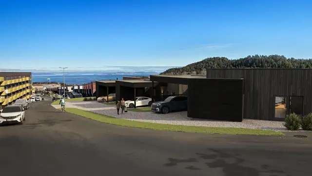 Boligene ligger øverst i Tesliåsen ved rundkjøringen, grensende mot store friområder. Dobbel carport i tilknytning til sportsbod. (Illustrasjon av boliger med fotomontasje - avvik 