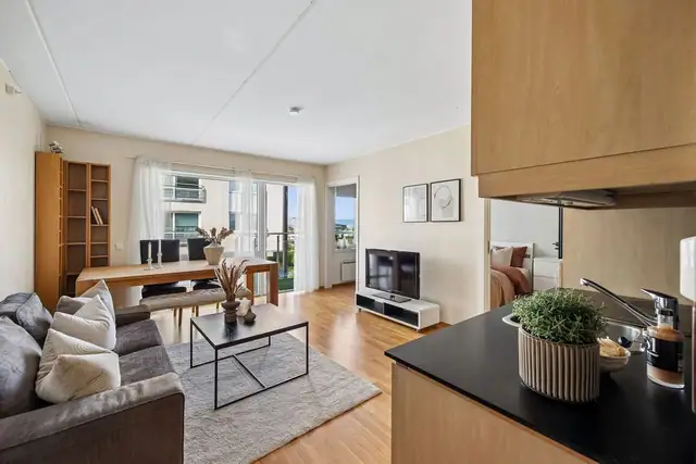 Bright, space-efficient 2-room flat in sought-after Solsiden. 4th floor. Lift. West-facing balcony. District heating. Communal roof terrace. — image 10